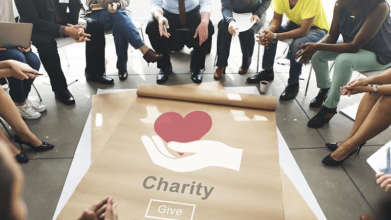 Trustees reviewing trust deed and charitable plans in India