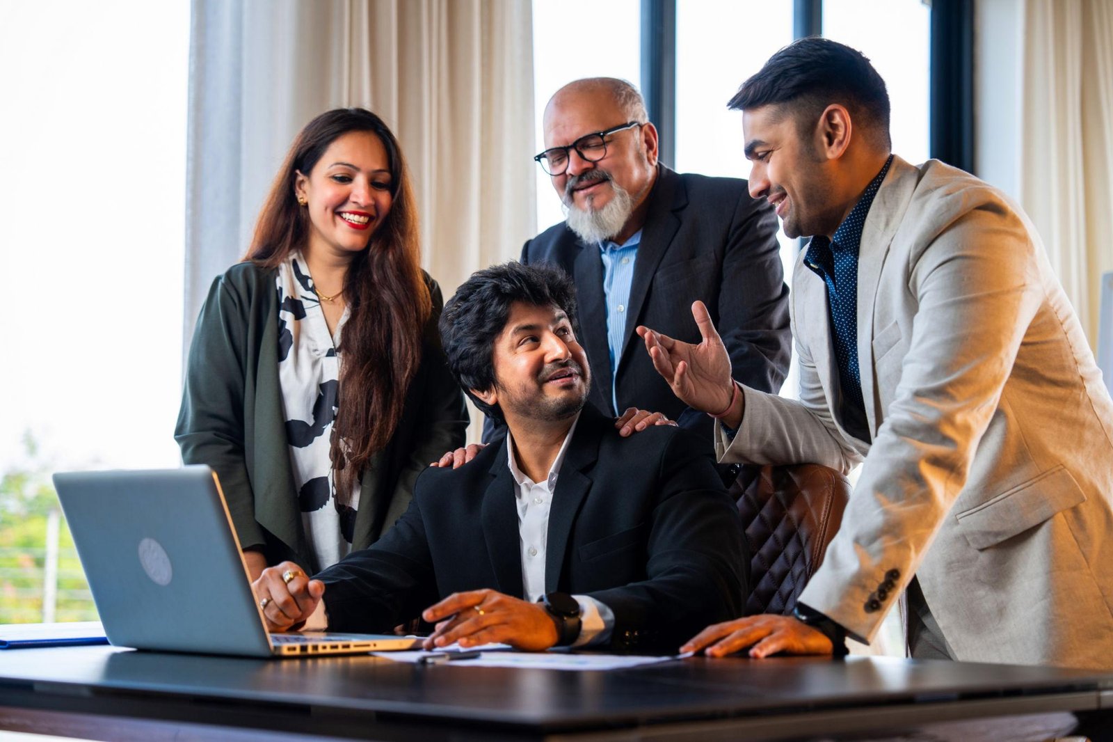 Professional team discussing business strategy in office
